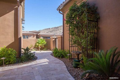 View from front door thru gated courtyar