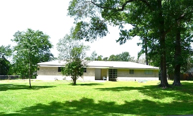 This property boasts beautiful trees and peaceful