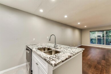 Kitchen featuring dark hardwood / wood-style floor
