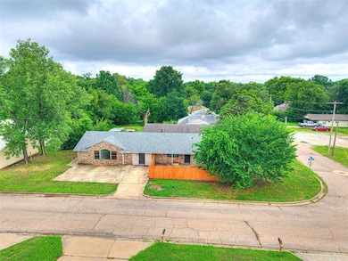 View of front of property with a front lawn and brick siding