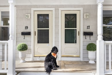 Adorable front porch shared by both units.