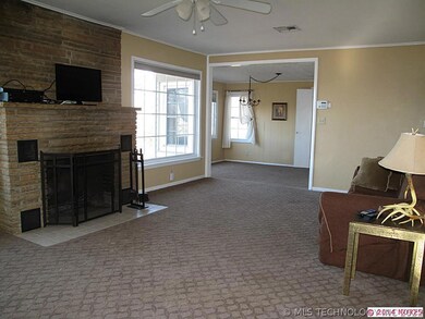 Stone wood burning fireplace with heat-a-lator