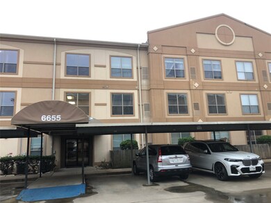 Exterior view of the 6655 building and covered car