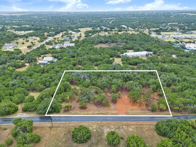 Aerial view of property's location with property parcel outlined