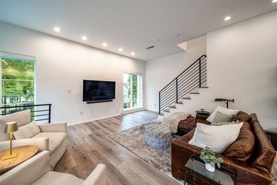 Living room featuring recessed lighting, visible v