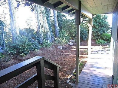 Come up the covered walkway and enjoy the landscap