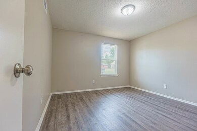 Unfurnished room featuring wood-type flooring and 