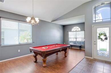 Formal Dining w/ wood floors and loads of natural 