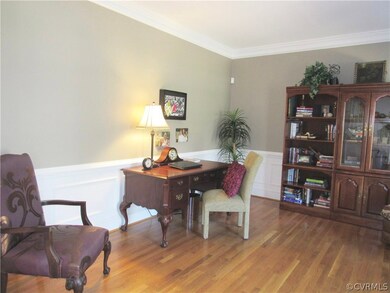 First floor office/ living room w/ hardwood floors