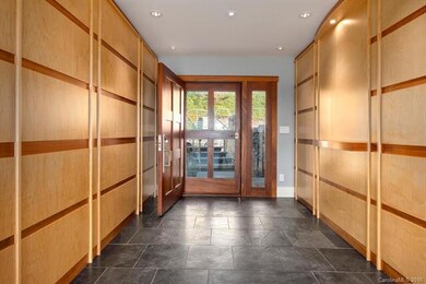 Gracious Entryway. Slate Tile. Sophisticated Light