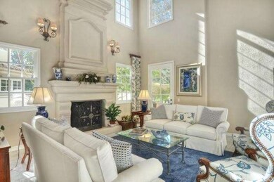 An abundance of light, two story ceiling and a mas