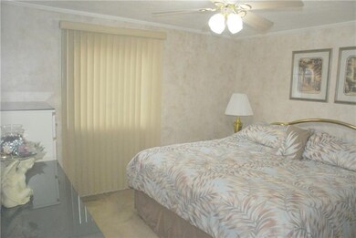 Spacious Master bedroom with privacy blinds and up