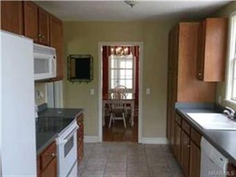 view through kitchen into dining room
