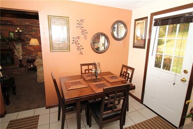 Eat-in Kitchen w/ Door to 12x20 Partially Covered 