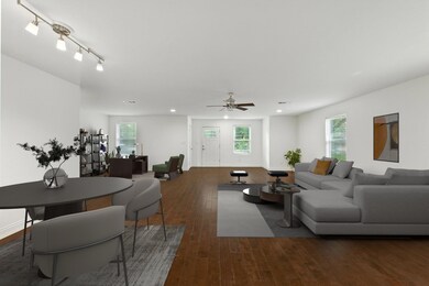 Living area featuring hardwood / wood-style floor
