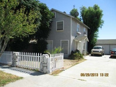 SIDE VIEW OF HOUSE FROM ENTRANCE