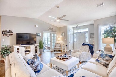 Living room with light wood-type flooring, ceiling