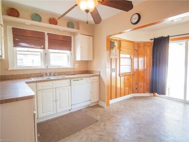 Fully applianced eat-in kitchen with a sliding gla