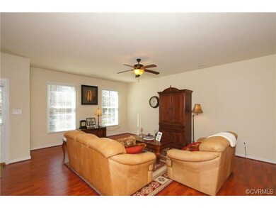 This spacious Living Room features wood laminate f
