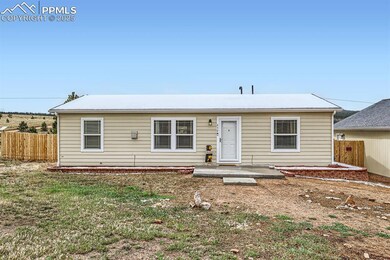 Single story home featuring fence and a patio