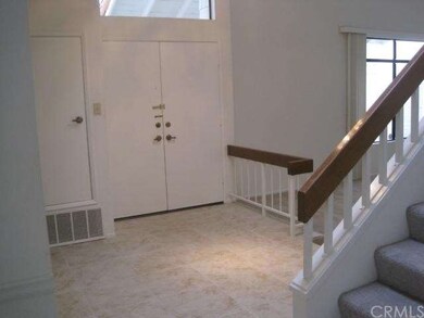 New Neutral Tile in Entry, Kitchen and Laundry Roo
