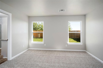 Spacious bedrooms and closets abound in this new home!