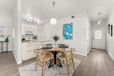 Dining space featuring light wood-style flooring 
