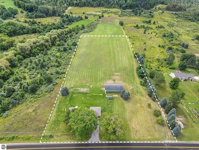 7420 E Birch Point Rd, Traverse City, MI 49684 - photo 2