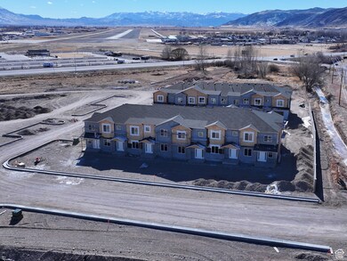 Birds eye view of property featuring a residential view and a mountain view