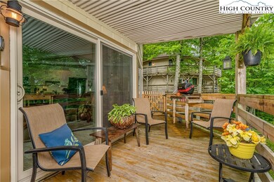 Sliding glass door leads out onto a large covered