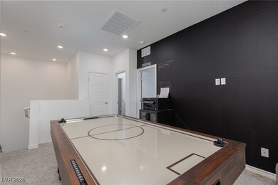 Recreation room with recessed lighting, visible ve