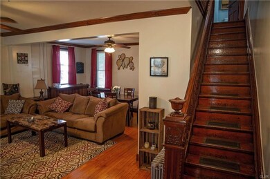 Hardwood floors and ornate woodwork