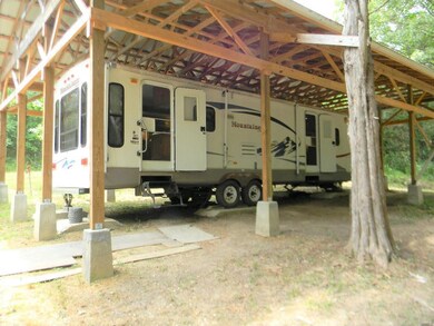 Travel trailer + 20.72 Acres!