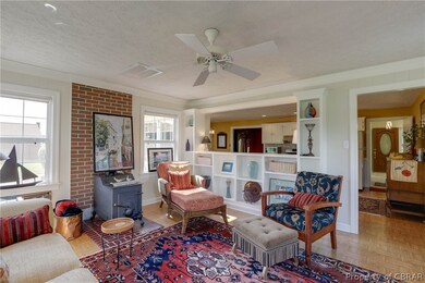 Wall of custom built bookshelves with open view in