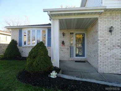 Exterior Front Inviting Covered Entrance