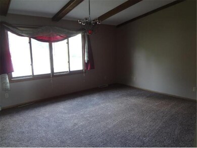 Living room with vaulted ceiling, picture window a