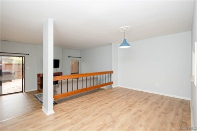 View of hardwood floored spare room