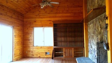Great room has oversized sliding door to 16' x 30'
