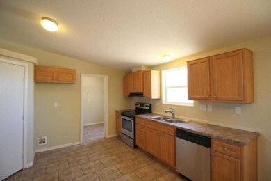 KITCHEN WITH NEW STAINLESS APPLIANCES