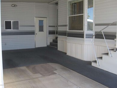 Carport looking toward bonus room
