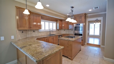 Island stovetop in Kitchen