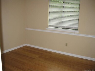 2nd bedroom with laminate flooring
