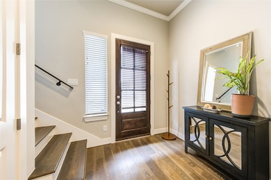 Welcoming foyer with soaring ceilings and stunning