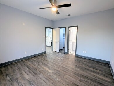 Spacious primary suite with a walk in closet