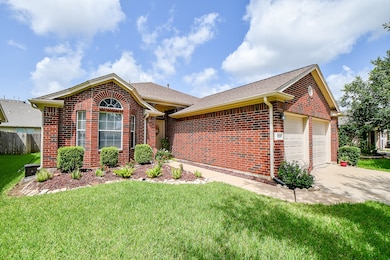 Gorgeous brick front with bay window and gutters a