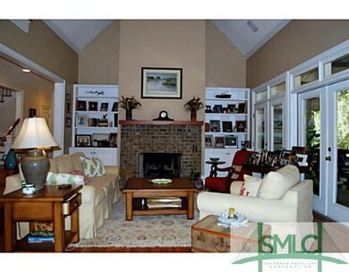 Den/Family/Great Room. The brick fireplace is flan