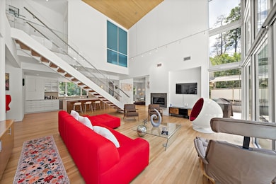 Inviting family room with tall ceilings and sleek