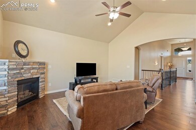 Spacious open concept living area boasts vaulted c
