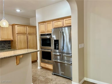 Kitchen featuring appliances with stainless steel