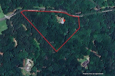 Over 3.5 acres of prime land - private, but only 2 miles from all the conveniences.